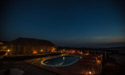 Pool by night Karatu Simba Lodge