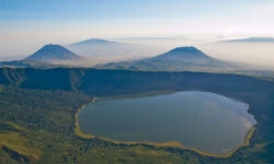 CN3664 Empakai crater and lake, in the background Ol Doinyo Lengai (left) and Keremasi (right), aerial view, Tanzania