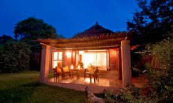 Africa; Botswana; Chobe National Park; Sanctuary Chobe Chilwero; Room exterior at night