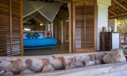 Matemwe-Retreat-bedroom-overlooking-beach